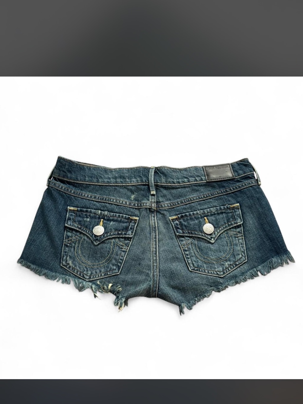 True Religion low rise Dark Blue Denim Frayed Hem Shorts. Size 25